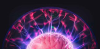 Human brain with colorful electrical energy currents.