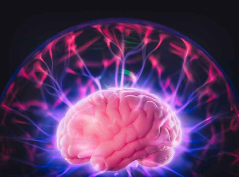 Human brain with colorful electrical energy currents.