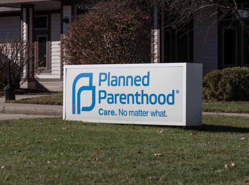 Planned Parenthood sign outside building.