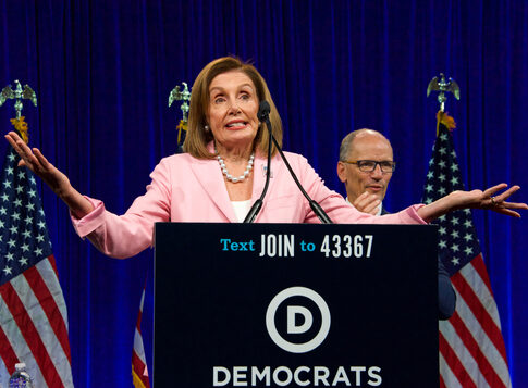 Nancy Pelosi speaking at Democratic National Committee event.