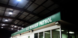 U.S. Border Patrol building at night.