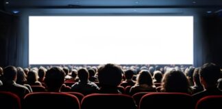 Audience watching a movie in a theater