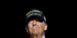 Person wearing a Make America Great Again cap