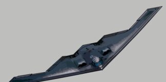 Stealth bomber aircraft on gray background