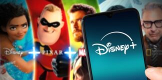 Disney+ logo on phone with movie characters background.