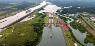 Aerial view of a canal with ships passing