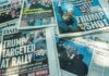 Newspaper headlines about an assassination attempt on Donald Trump.