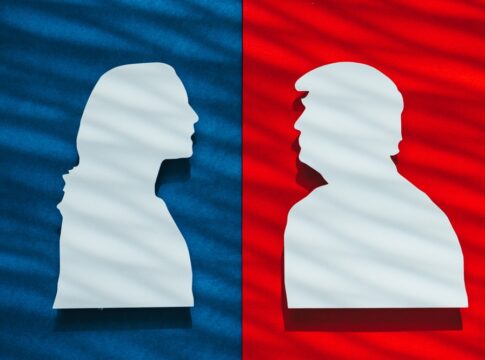 Two silhouette profiles on red and blue background