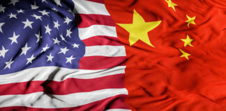 United States and Chinese flags side by side.