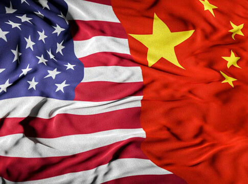 United States and Chinese flags side by side.